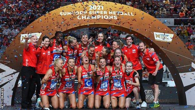 NSW Swifts celebrate winning the 2021 Super Netball Grand Final