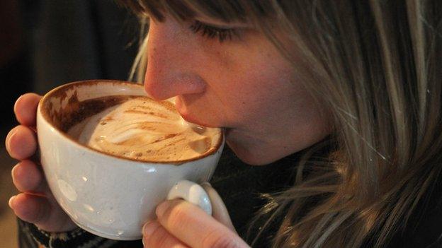 woman drinking coffee