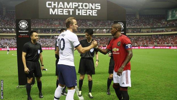 Harry Kane shakes hands with Ashley Young before Tottenham's International Champions Cup match against Manchester United in Shanghai in July 2019