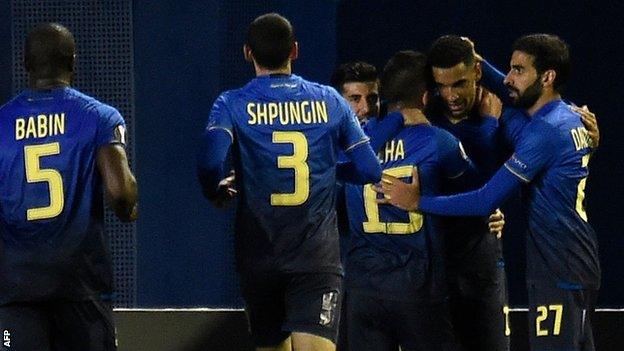 Nick Blackman (second from right) is congratulated after scoring