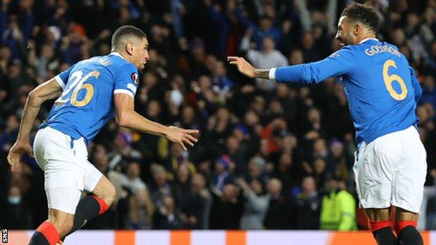 Rangers' Leon Balogun and Connor Goldson celebrate