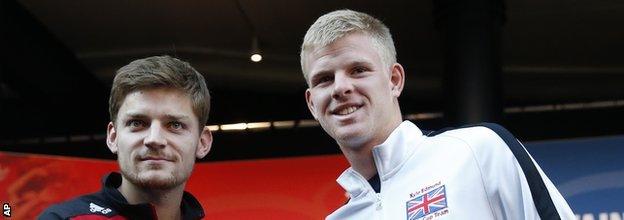 David Goffin and Kyle Edmund shake hands