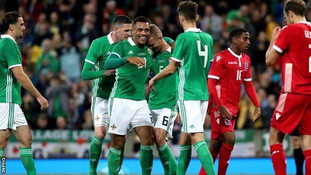 Josh Magennis celebrates a goal