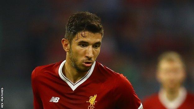 Marko Grujic passes to a Liverpool team-mate