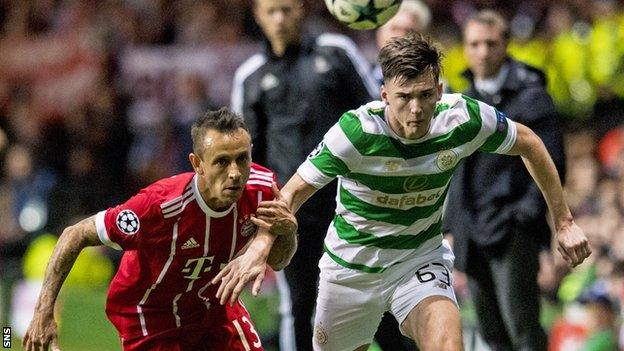 Kieran Tierney in action with Bayern Munich's Rafinha