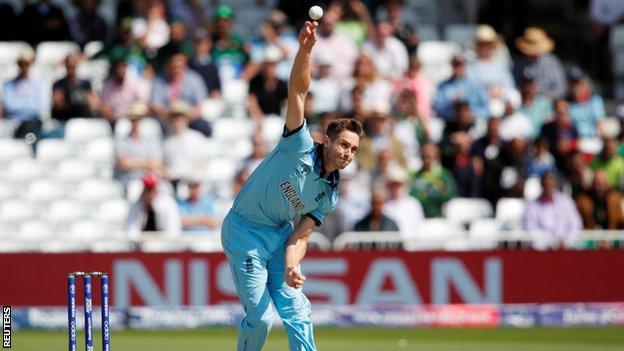 Chris Woakes bowling for England