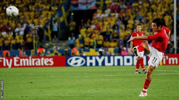 Joe Cole scores a volley for England against Sweden