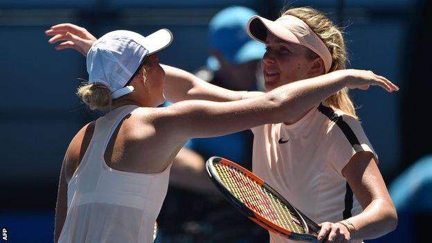 Svitolina and Kostyuk embrace at the end of the match