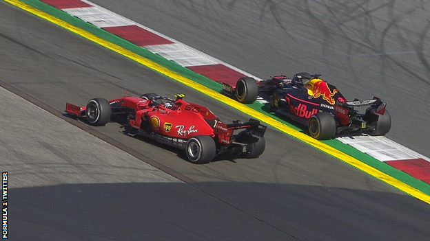 Charles Leclerc and Max Verstappen race side by side