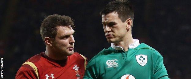 Dan Biggar and Johnny Sexton chat during a match