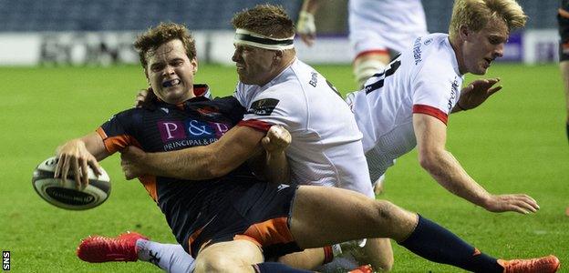 Chris Dean scores a try for Edinburgh against Ulster