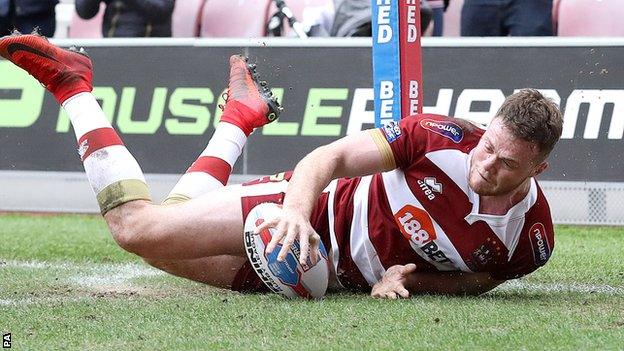 Joe Burgess scores a try for Wigan Warriors