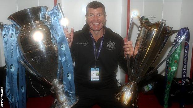 Rob Baxter poses with trophies