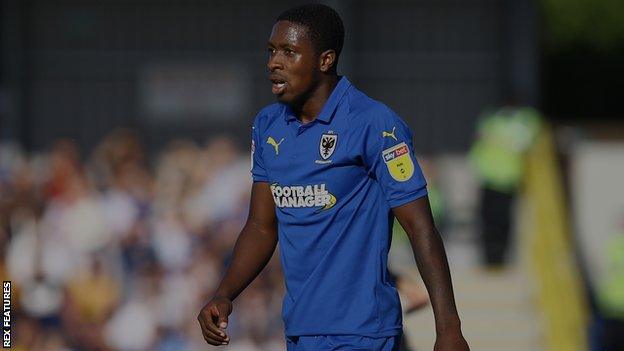 Michael Folivi in action for AFC Wimbledon