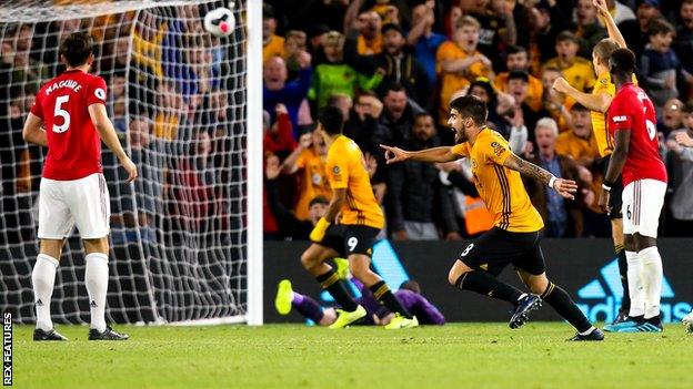 Ruben Neves (second right)