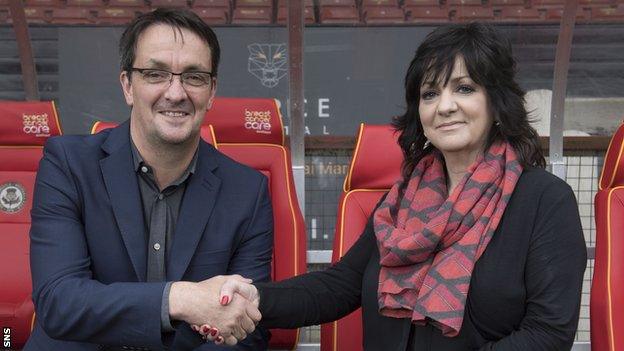 Gerry Briton and Jacqui Low in the dugout