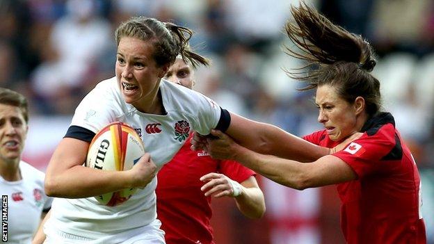 Emily Scarratt hands of a Canada defender