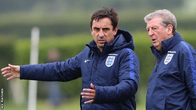 England manager Roy Hodgson (right) and his assistant Gary Neville