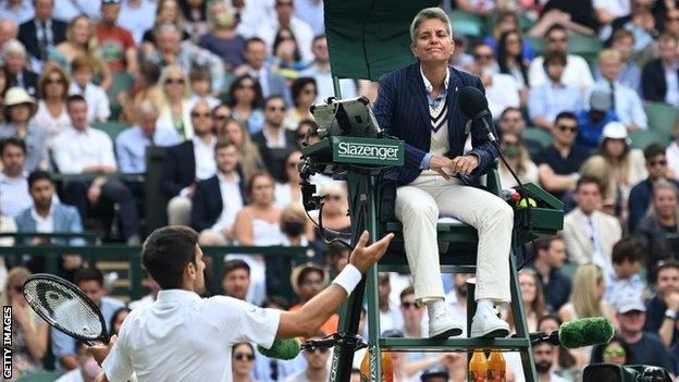 Novak Djokovic talks to umpire Marija Cicak