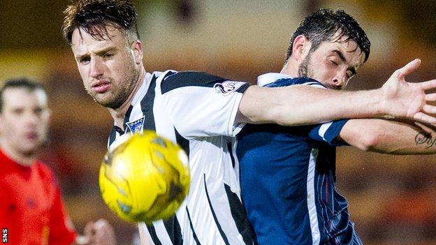 Brad McKay (left) in action for Dunfermline