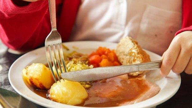 Child eating a school dinner