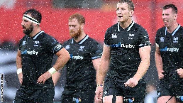 Scott Baldwin, Dan Baker, Bradley Davies and Adam Beard of Ospreys look dejected