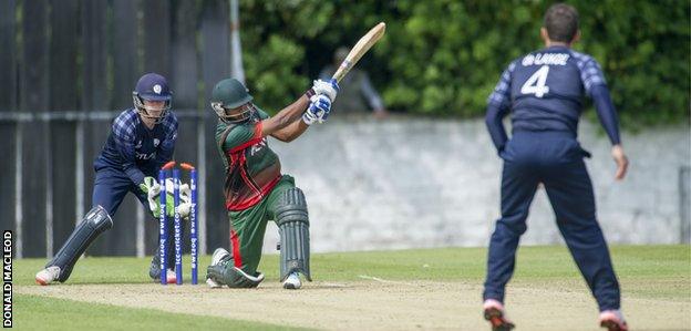 Con de Lange takes the wicket of Rakep Patel for Scotland