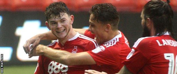 Oliver Burke (left) celebrates scoring for Nottingham Forest