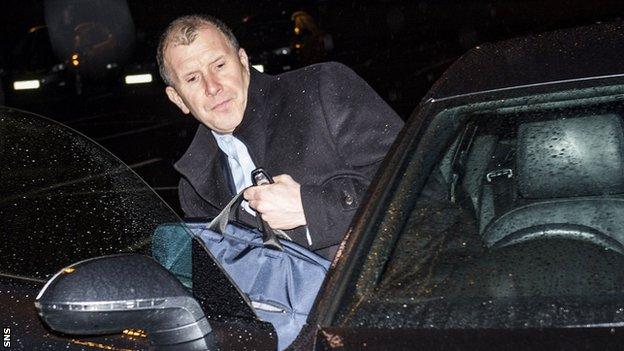 Stewart Regan gets into his car before leaving Hampden Park