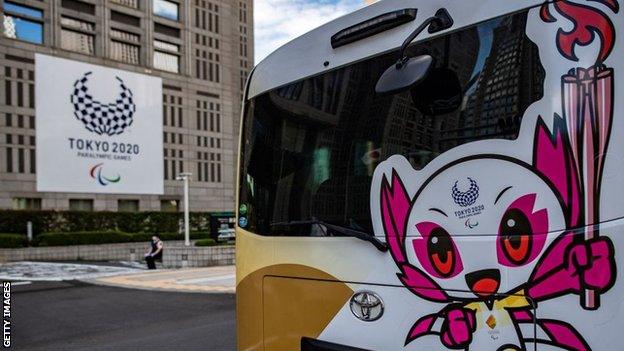 The Tokyo 2020 Paralympic mascot, Someity, is displayed on a bus in the Japanese capital