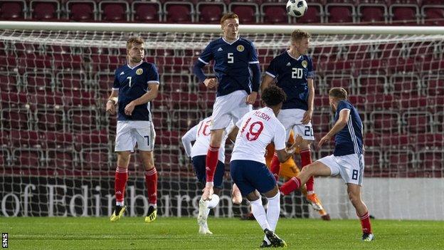 England U21's Reiss Nelson scores with a free-kick against Scotland