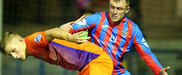 Andy Mitchell made sure of Glenavon's win with the second goal against Ards
