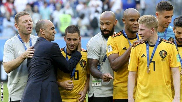 Belgium boss Roberto Martinez, assistant Thierry Henry and players Eden Hazard, Vincent Kompany and Kevin de Bruyne celebrate after winning the third-place play-off at the 2018 World Cup