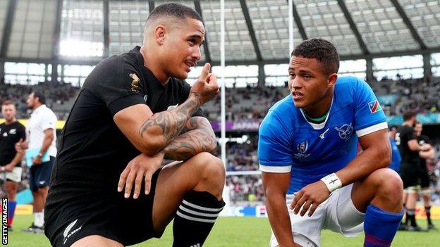 Aaron Smith of New Zealand with opposite number Helarius Kisting