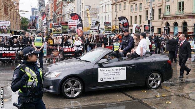 A group of protesters gathered during the Melbourne Cup parade