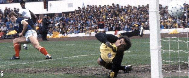 Mark McGhee scores for Scotland against England in 1984