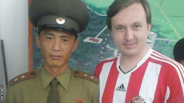 Tom Fowdy with a North Korean soldier