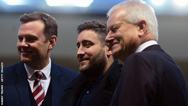 City head coach Lee Johnson answers to Mark Ashton (left) and owner Steve Lansdown (right)