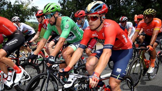 Bahrain-Merida cyclist Rohan Dennis rides in the peloton during the 2019 Tour de France