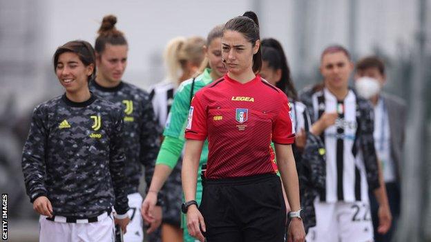 Players walk out behind referee Maria Sole Ferrieri Caputi prior to kick off in a Women's Serie A match between Juventus FC and FC Internazionale