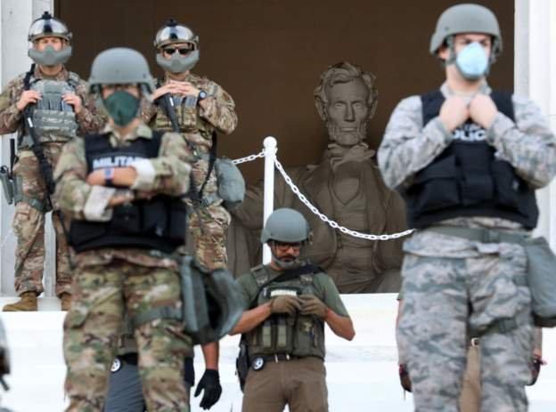 The US capital city Washington DC saw soldiers on the street keeping an eye on what was happening. These men are standing at the famous Lincoln Memorial - Lincoln was the President during the US Civil War which in part led to the abolition of slavery.