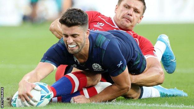 Adam Hastings scored two early tries in a one-sided victory for Scotland