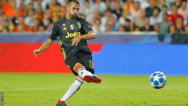 Miralem Pjanic scores a penalty for Juventus