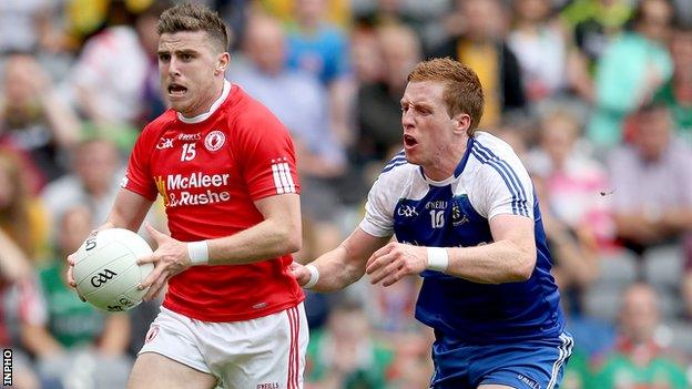 Connor McAliskey attempts to brust away from Kieran Duffy at Croke Park