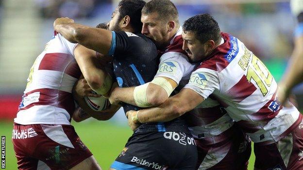 Only one first-half try was scored by Huddersfield against Wigan in a tight defence-dominated first half at the DW Stadium