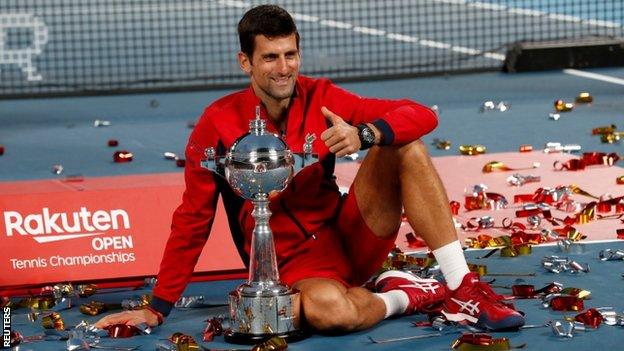 Novak Djokovic with the Japan Open trophy