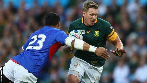 Jean de Villiers carries the ball against Samoa