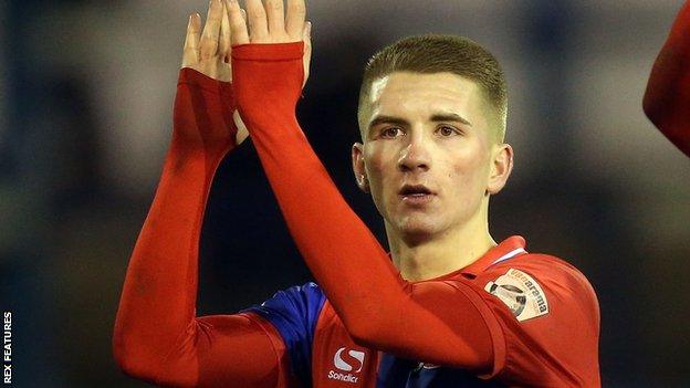 Sam Ling applauds Dagenham's fans after a match