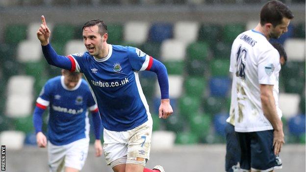 Andrew Waterworth celebrates his 100th goal for Linfield in the Windsor Park win over Ards