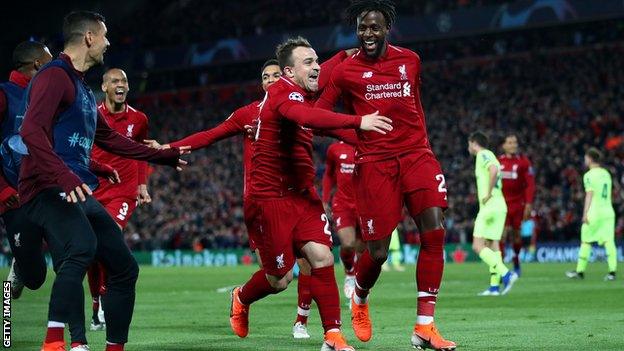 Origi celebrates with Xherdan Shaqiri after scoring against Barcelona, 2019.